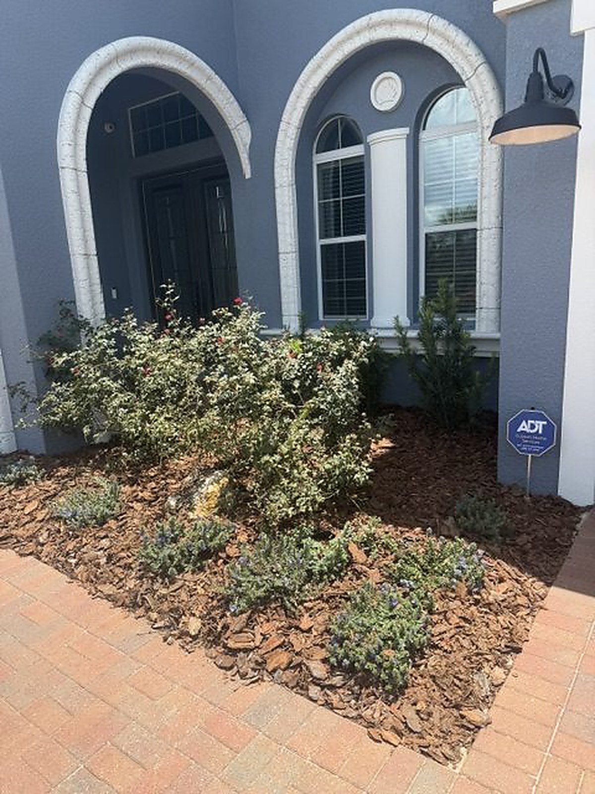 Fresh planting beds along a home