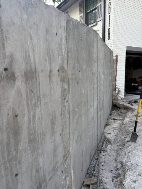 New concrete driveway with paver banding