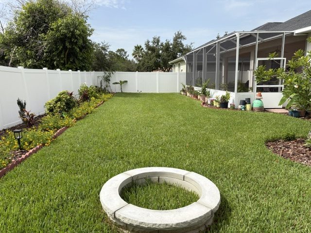 Artificial turf backyard lawn with paver border